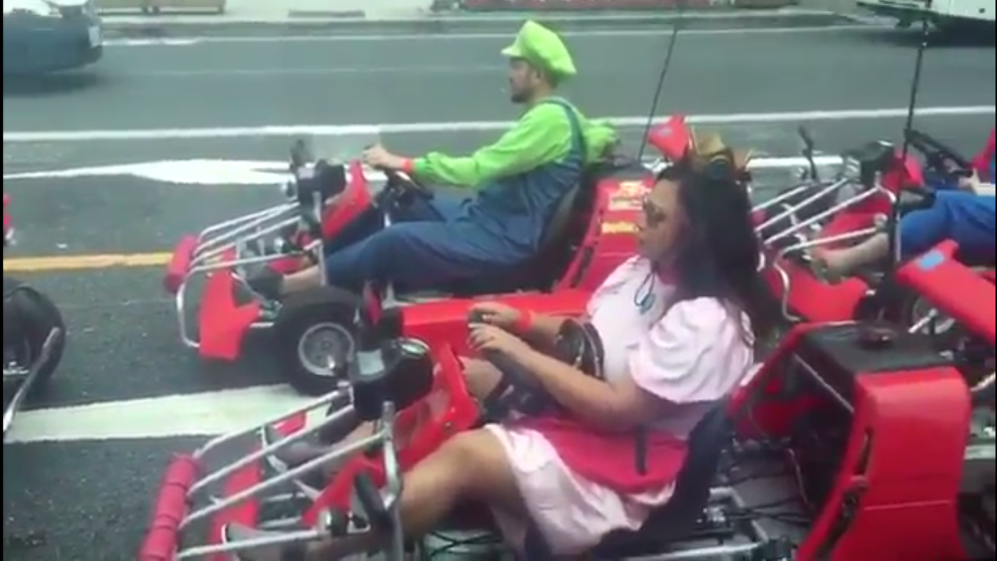 Watch Hugh Jackman Stumble Upon Real Life Mario Kart in Tokyo Traffic