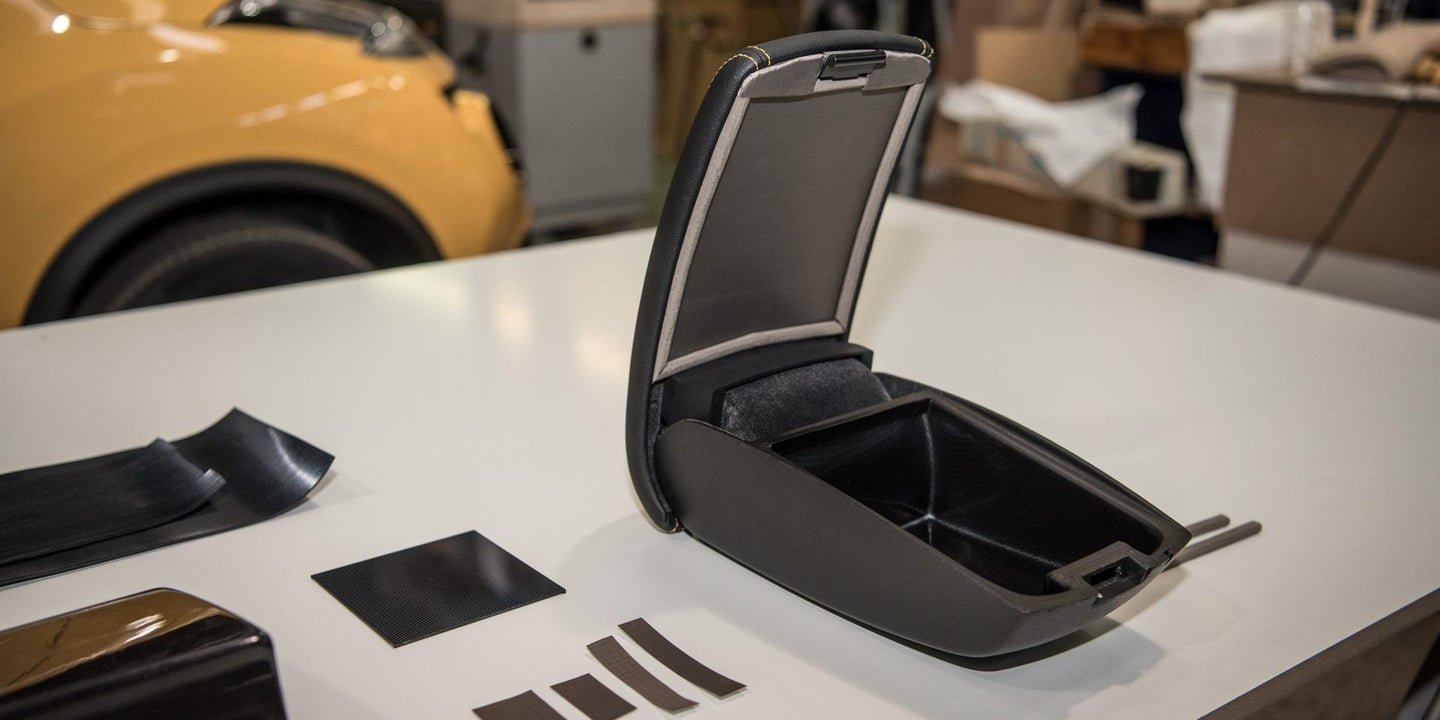 Nissan Tests ‘Signal Shield’ Armrest Faraday Cage to Combat Distracted Driving