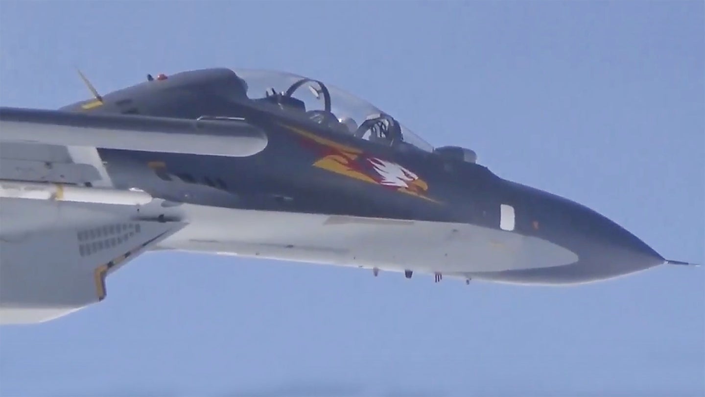 Chinese Su-30 Flanker Goes Inverted Over USAF Nuke Sniffing Plane