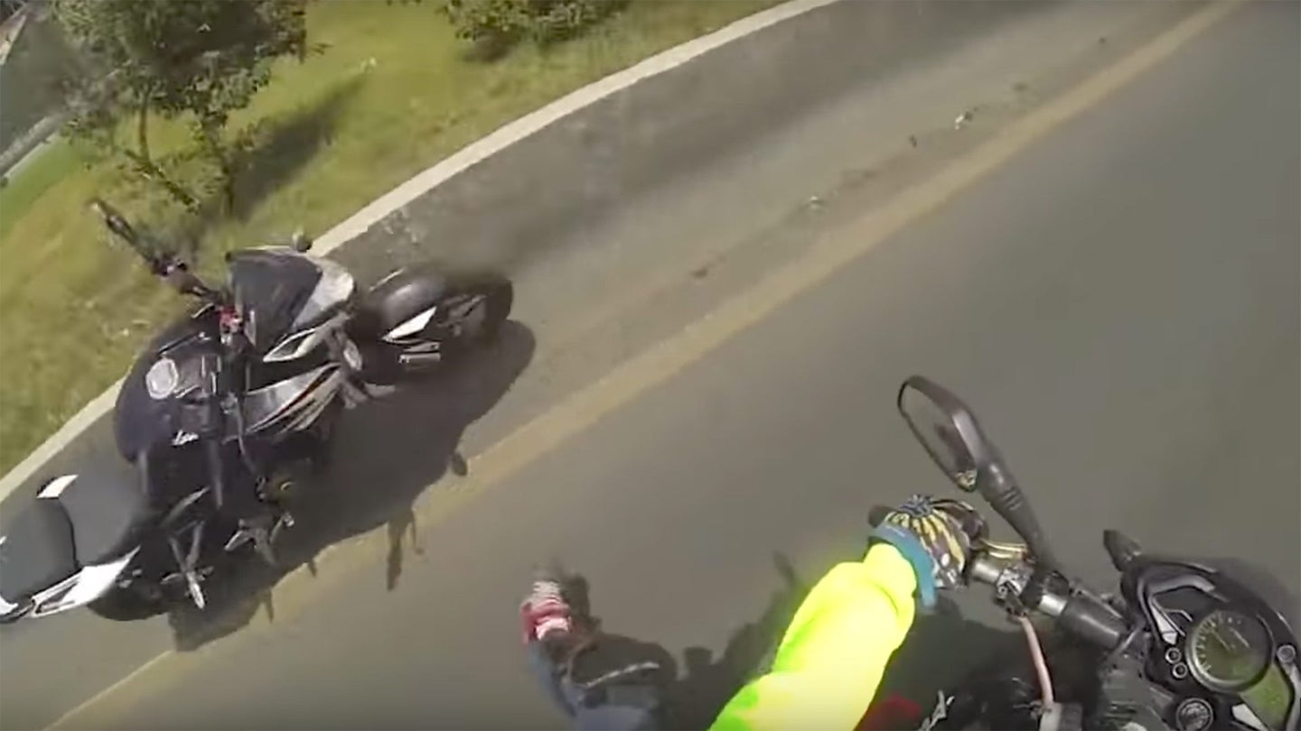 Runaway Motorcycle Takes Out Rider Trying to Save It