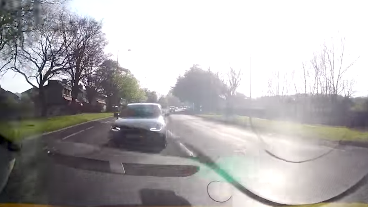 Watch an Allegedly Distracted Driver in an Audi Nearly Cause a Head-On Wreck