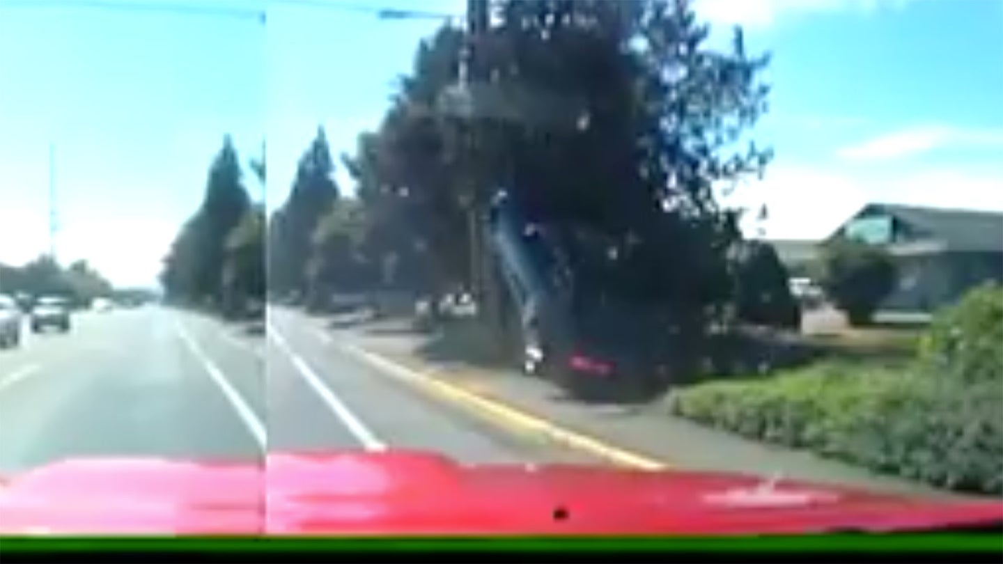Watch This Chevy Camaro Drive Straight Up a Telephone Pole