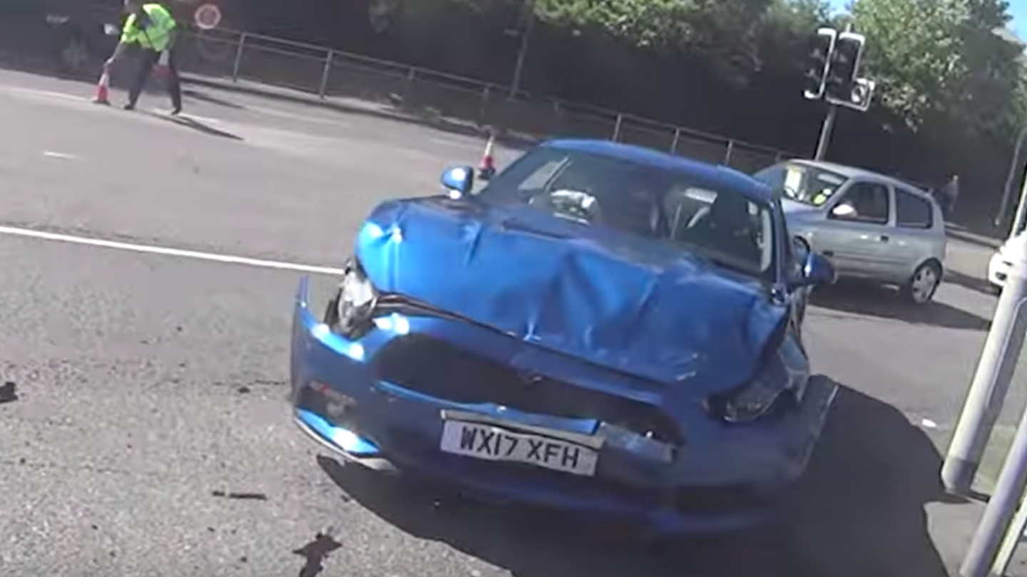 Watch This Ford Mustang T-Bone a Hatchback At an Intersection