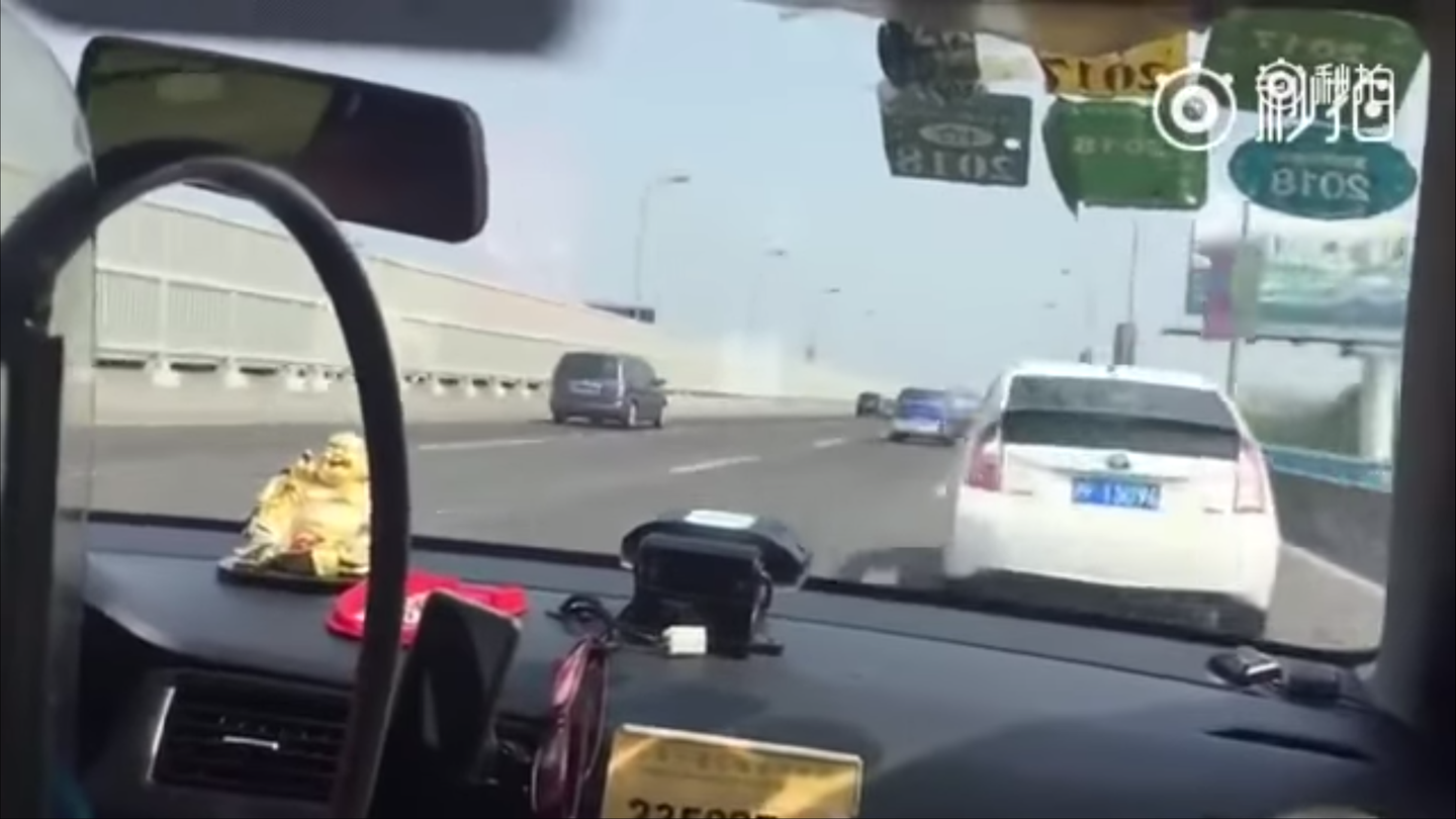 Watch This Shanghai Taxi Driver Pass 50 Cars in Under 2 Minutes