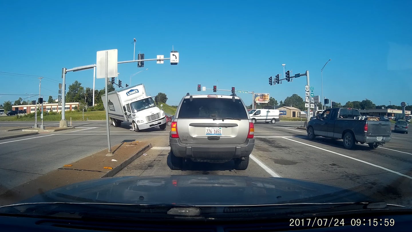 Special Delivery: Watch a Lowes Truck Tip Over After Running a Traffic Light