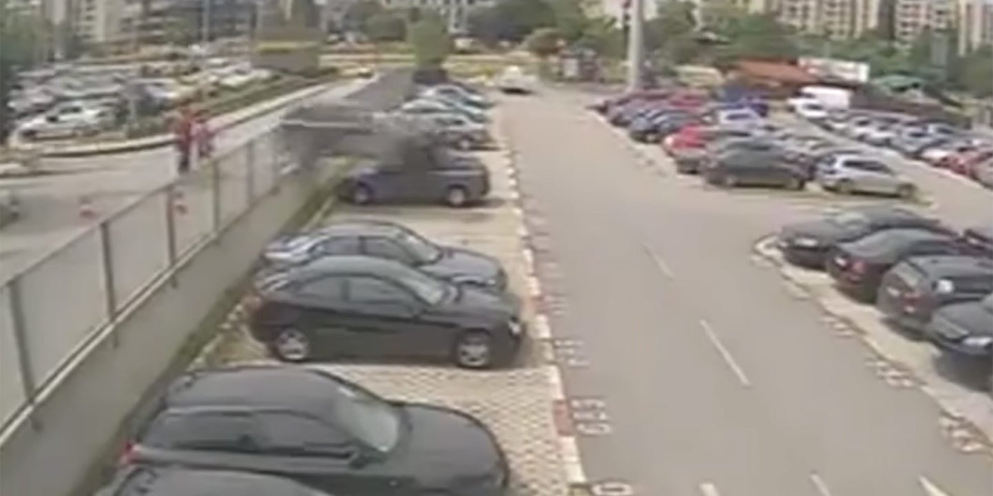 Driver Mistakes Accelerator For Brake, Plummets Off Retaining Wall