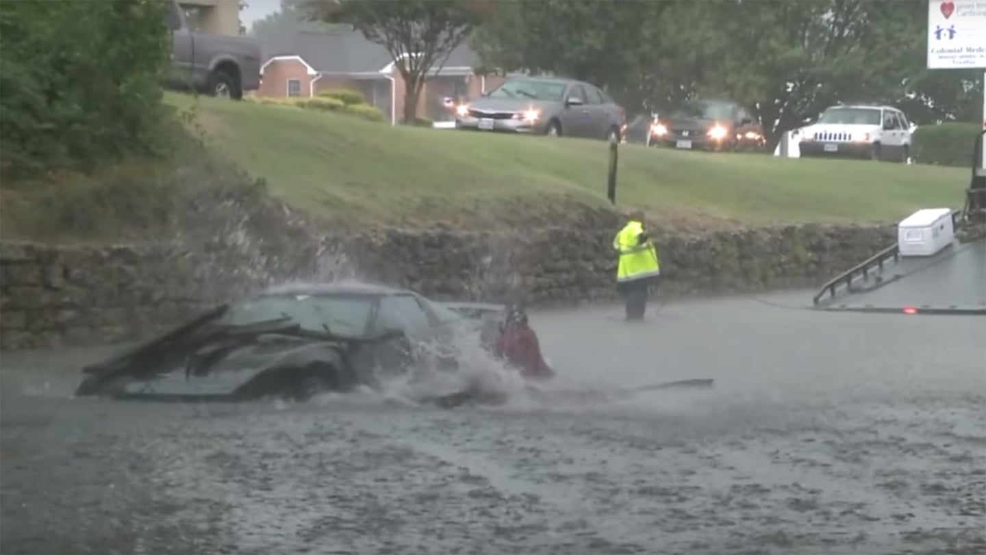 Corvette Owner Nearly Gets Knocked Out Trying To Save Flooded Car