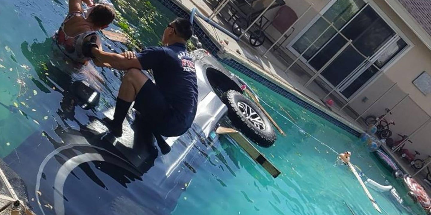 Ford F-150 Raptor Crashes Into Pool With Lady Still Inside