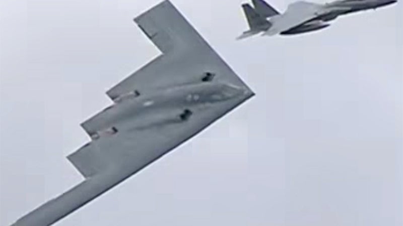 B-2 Stealth Bomber Flanked By F-15s Stuns At The Royal International Air Tattoo