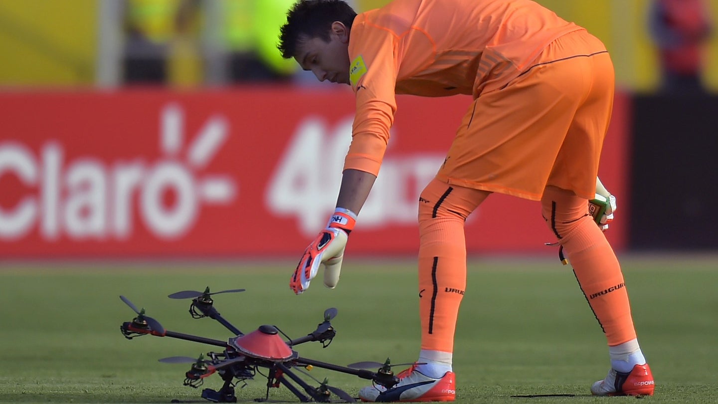 Watch a Drone Get Knocked Down by Toilet Paper Roll at a Soccer Match