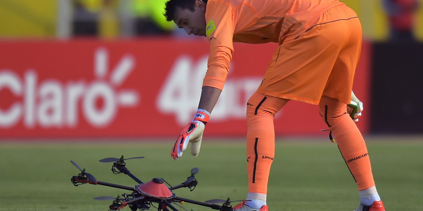 Watch a Drone Get Knocked Down by Toilet Paper Roll at a Soccer Match
