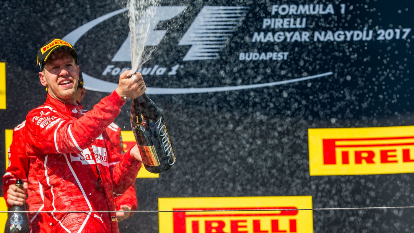 Vettel Claims Hungarian Grand Prix Victory Amidst Team Order Frenzy