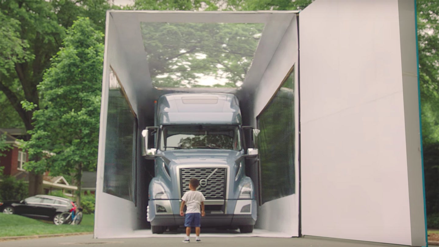 Watch a 3-Year-Old Unbox the 80-Foot-Long, All-New Volvo VNL Truck