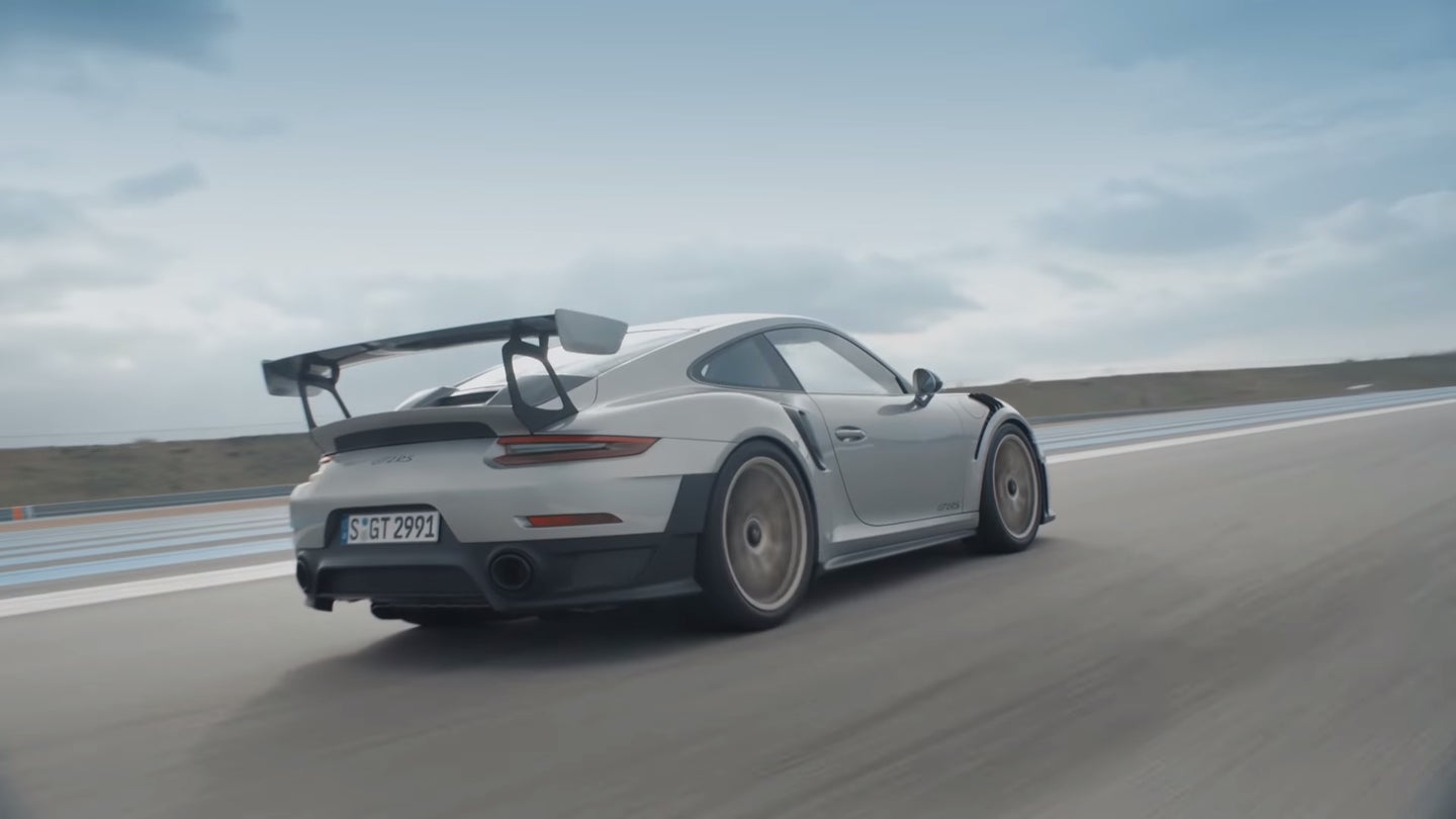 Watch Walter Rohrl and Mark Webber Flog a Porsche 911 GT2 RS