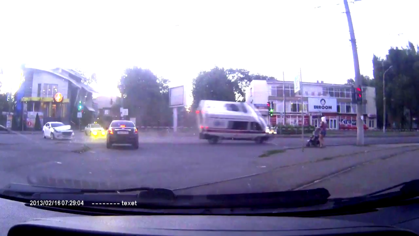 Watch This Ambulance Almost Flip After Getting T-Boned at an Intersection in Russia
