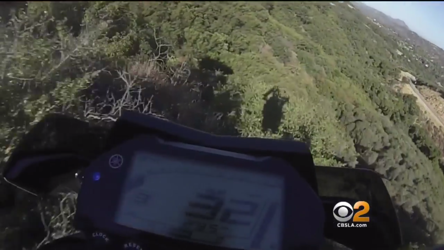 Watch This Motorcyclist Lose Control on a Mountain Road and Plunge Off a Cliff