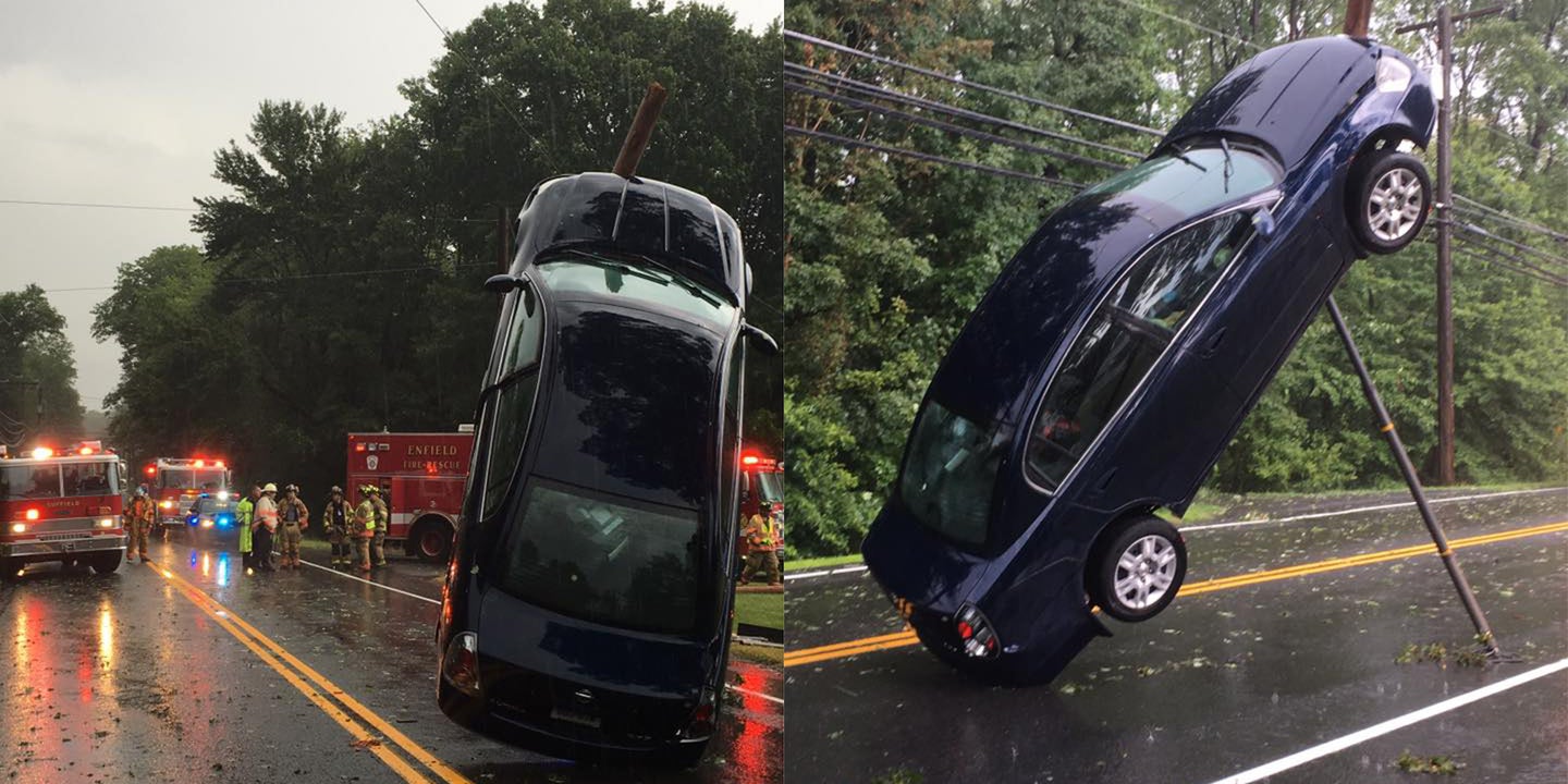 Car Hoisted Up by Power Lines Traps Family
