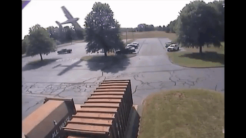 Watch This Airplane Crash Into a Tree and Flop Into a Parking Lot