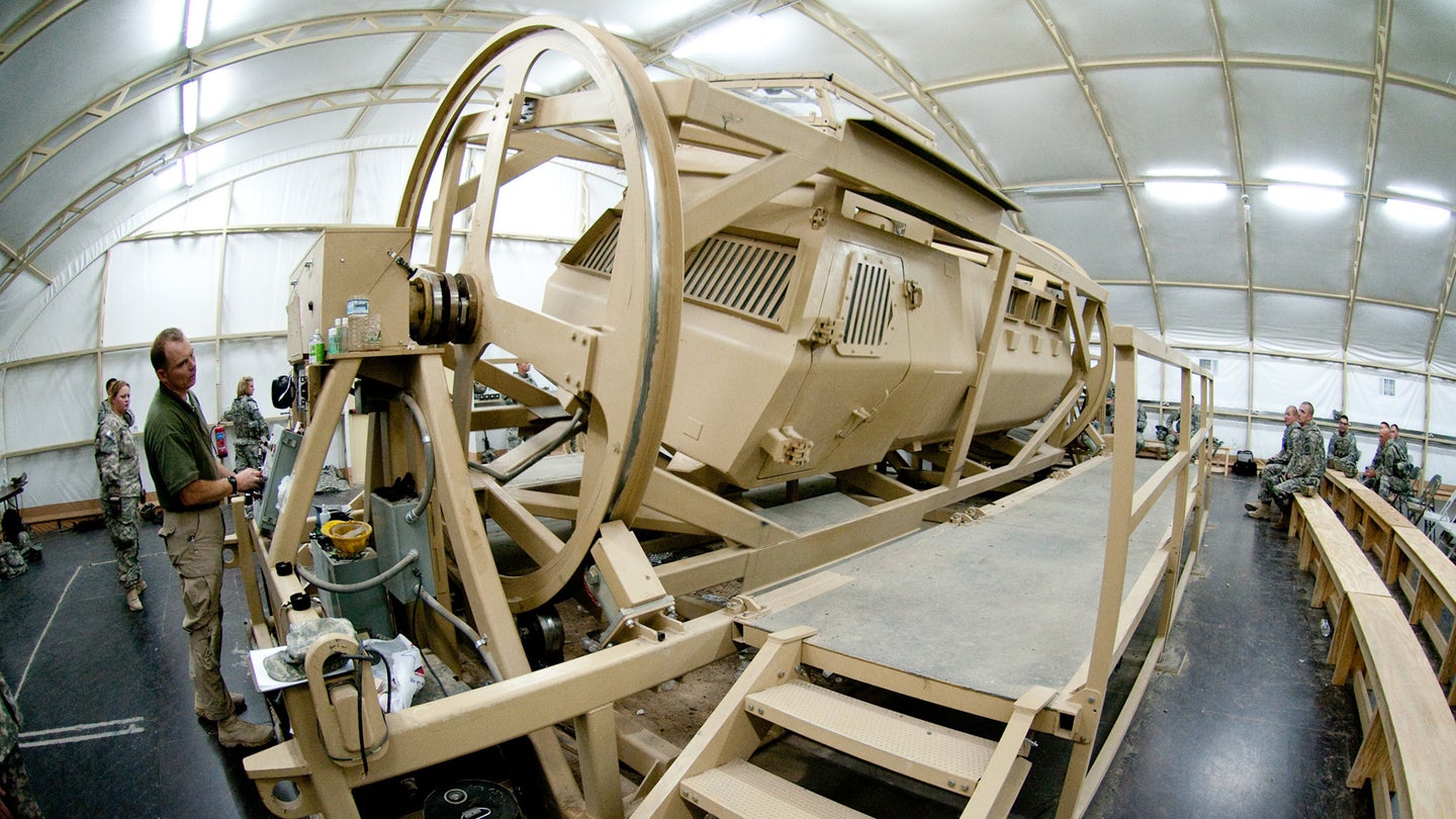 These Armored Vehicle Rollover And Egress Simulators Ready Troops For A Bad Day