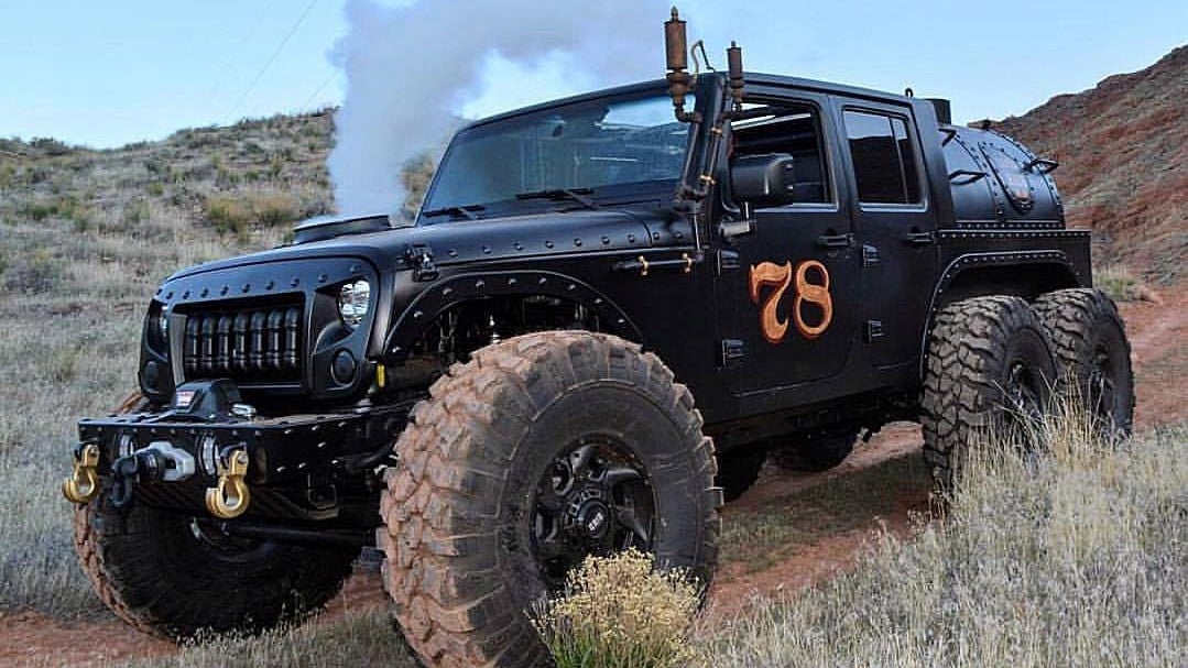 This Jeep Wrangler Has Six Wheels and a Steam Engine
