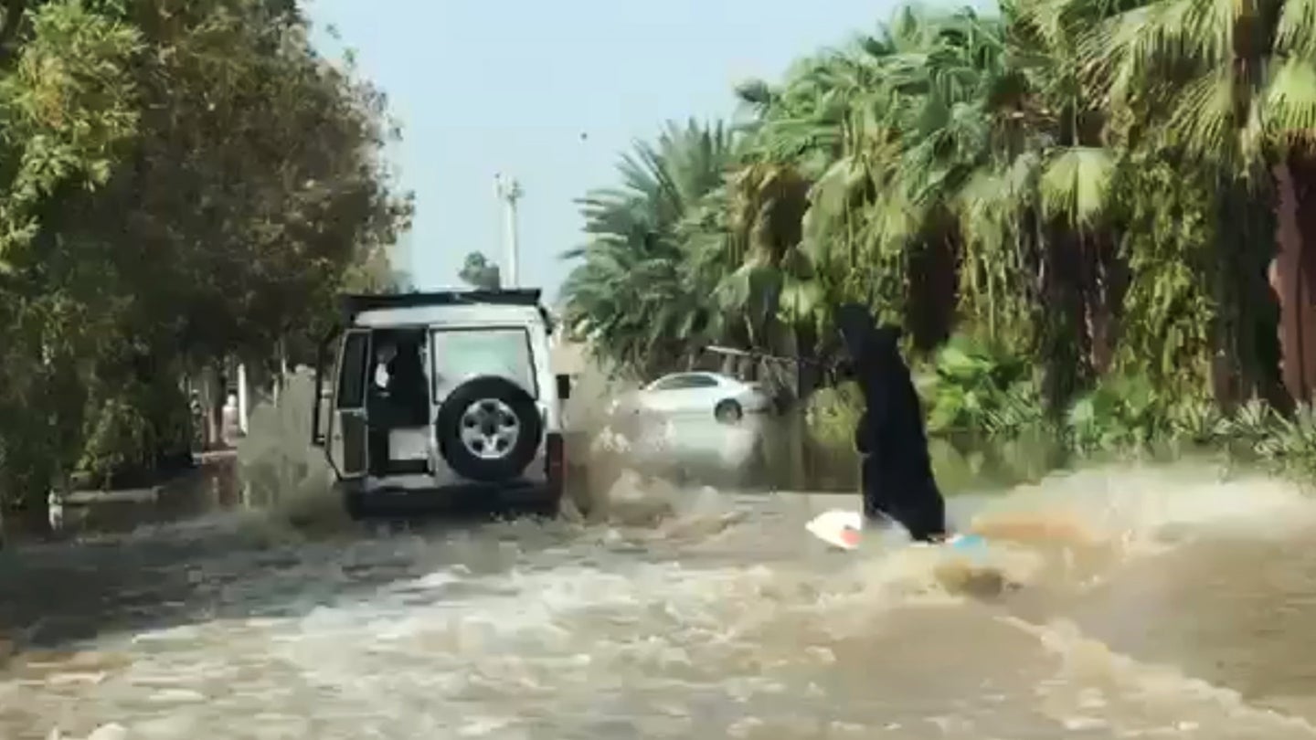 Watch This Saudi Woman Wakeboard Behind a Truck Down a Flooded Street