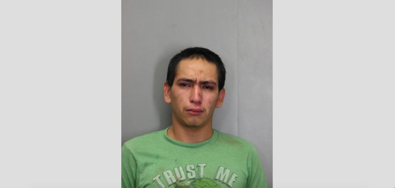 Man arrested in Trust Me t-shirt