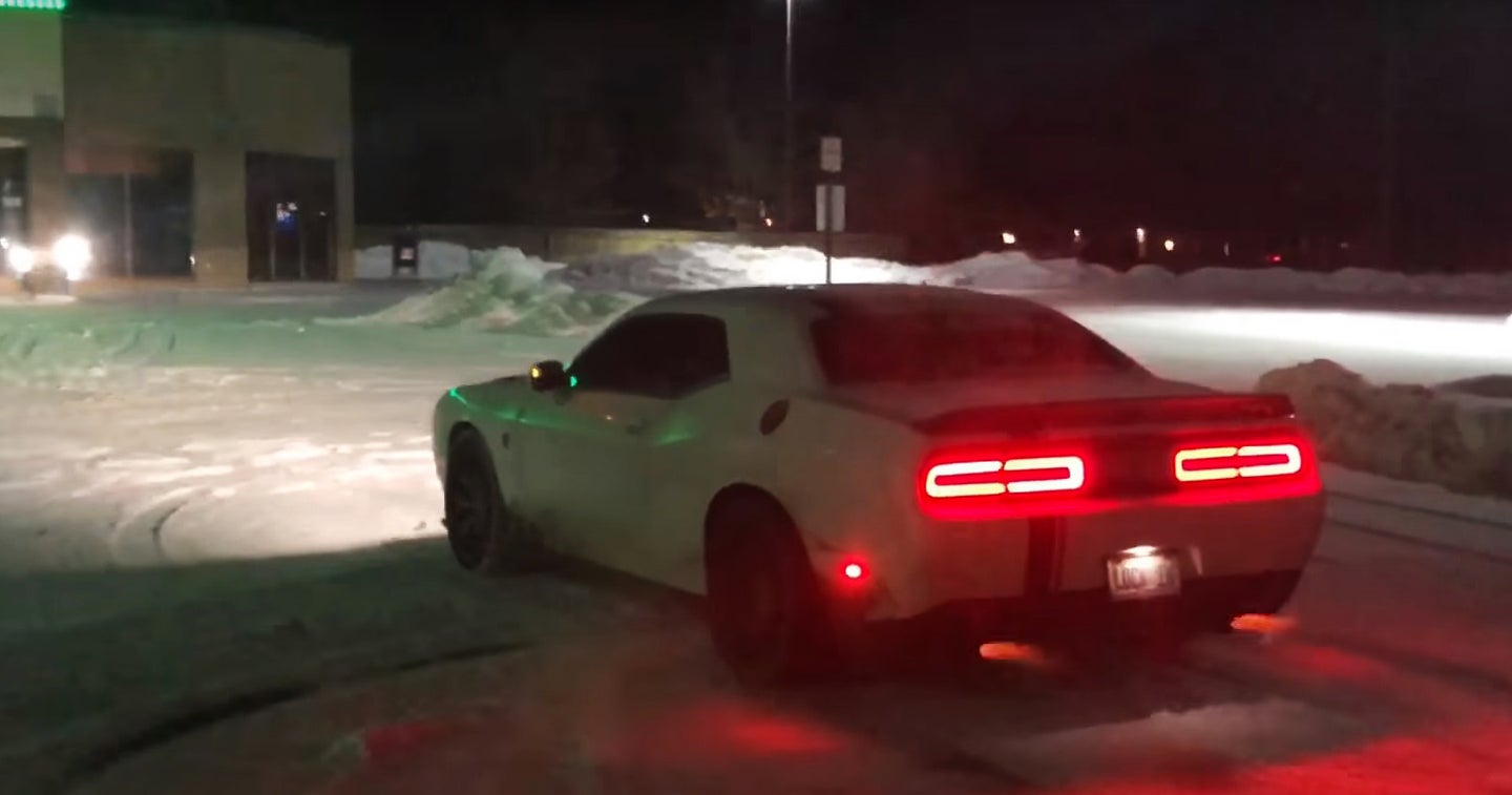 Warm Up With a Daily-Driven, 1,000-HP Dodge Hellcat Spitting Fire in the Snow