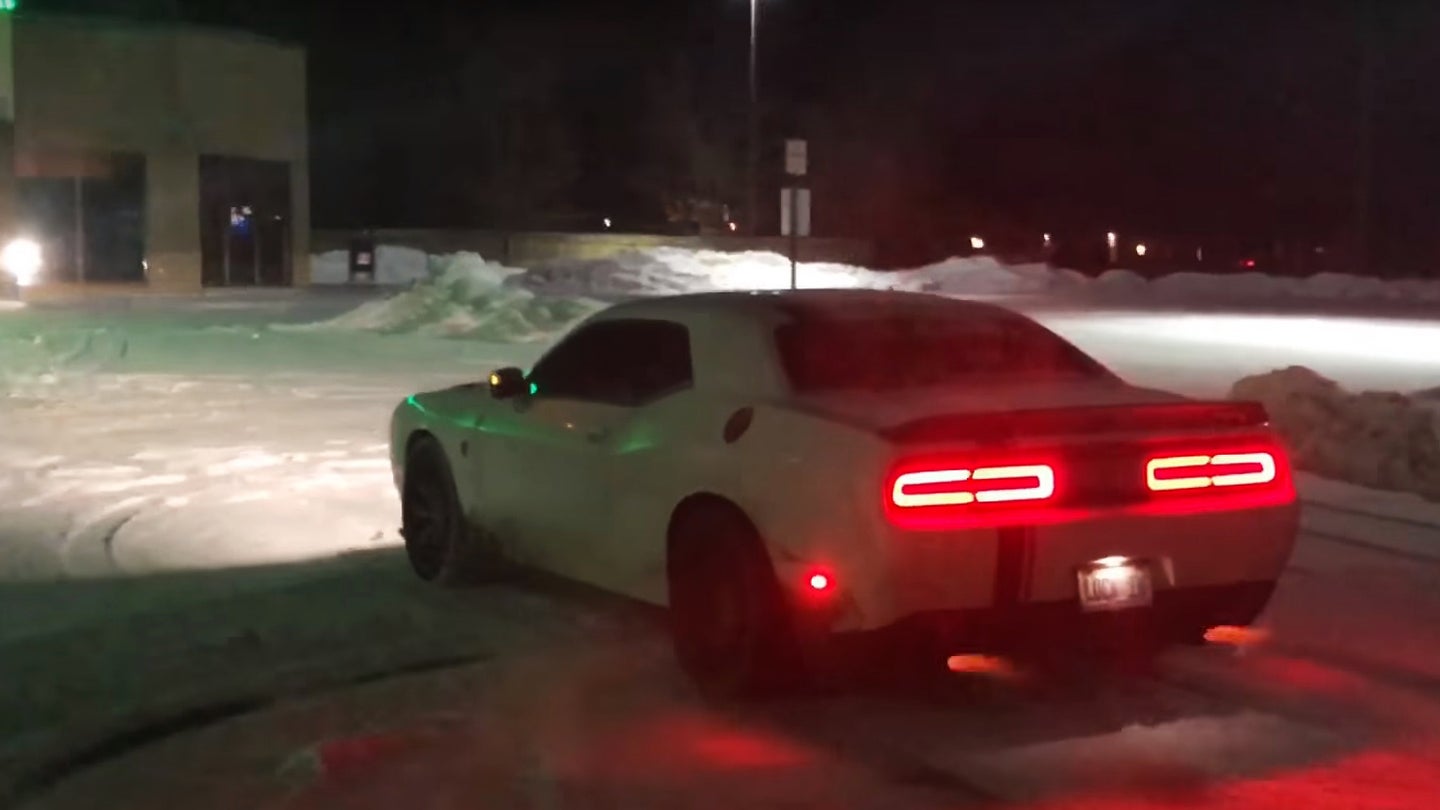 Warm Up With a Daily-Driven, 1,000-HP Dodge Hellcat Spitting Fire in the Snow