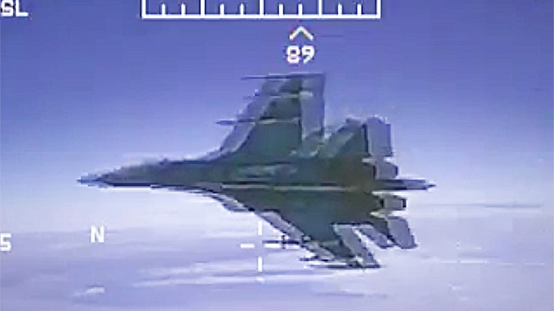 Navy Releases Video Of Russian Flanker Buzzing EP-3E Aries II Spy Plane