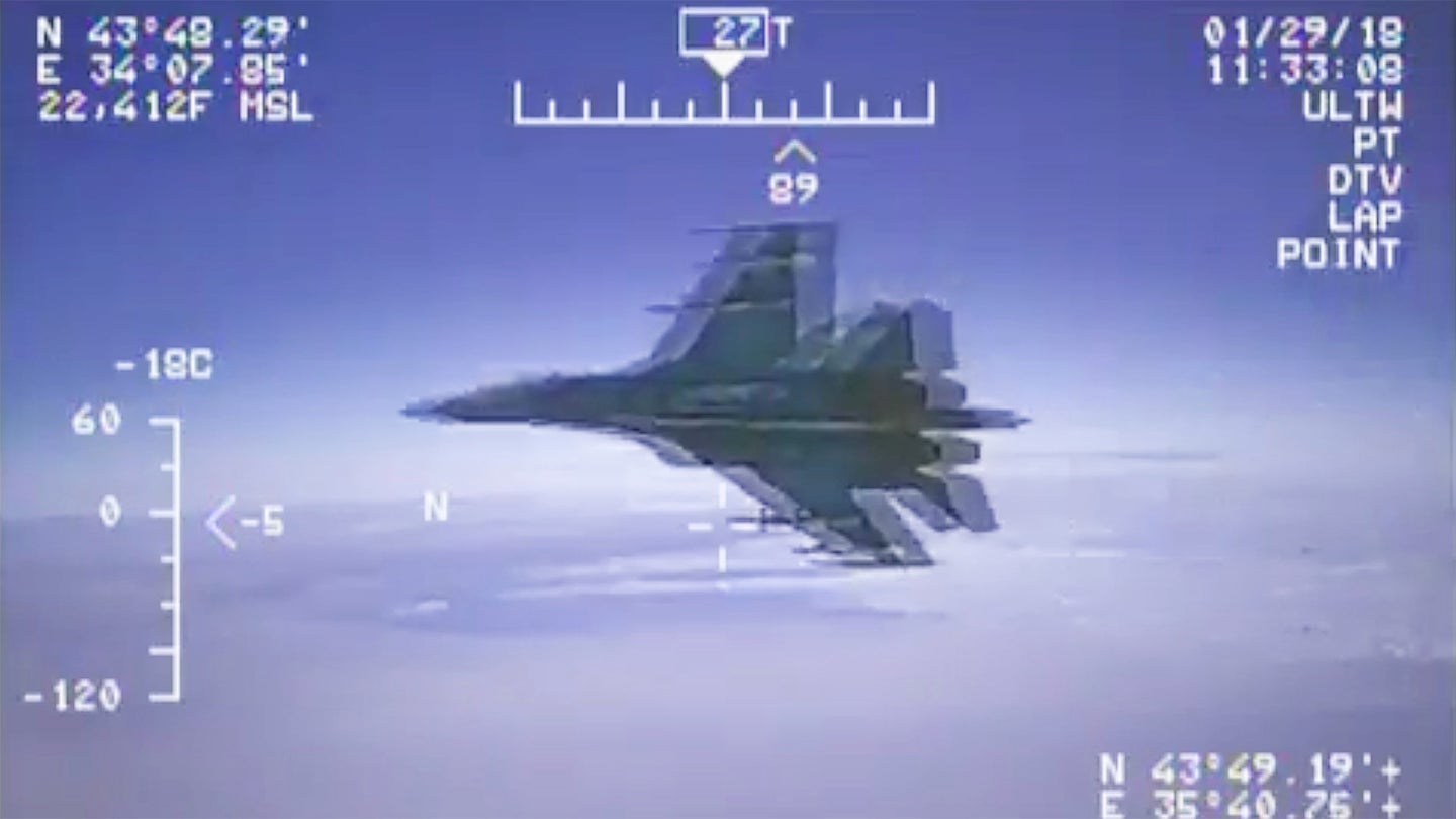 Navy Releases Video Of Russian Flanker Buzzing EP-3E Aries II Spy Plane