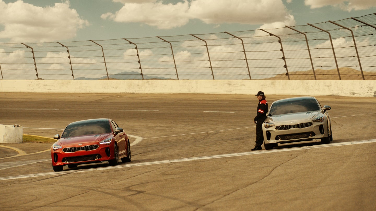 Kia Teases New Super Bowl Commercial With Fittipaldi and a Mystery Driver