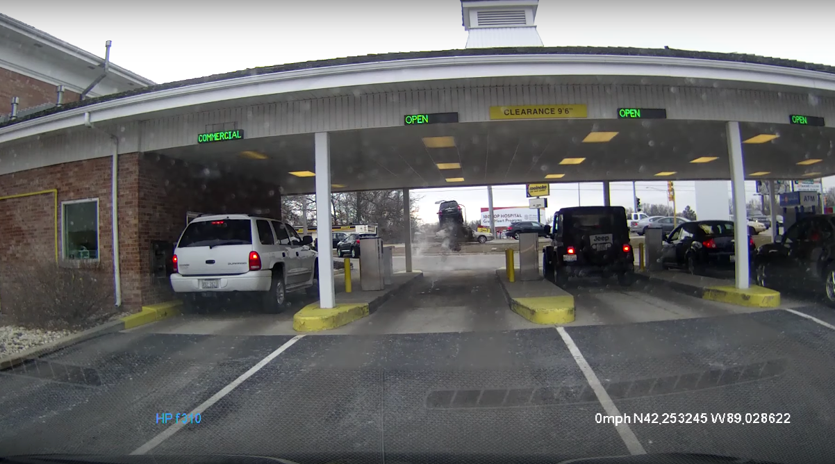 Watch as This KIA Jumps Over a Passing Car at a Drive-Through ATM