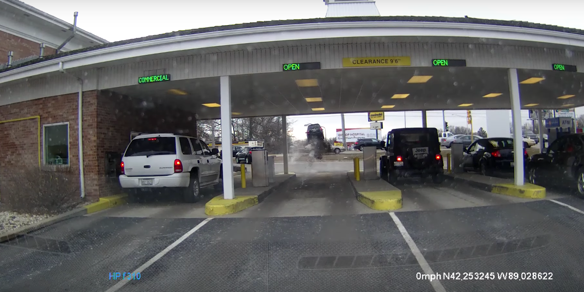 Watch as This KIA Jumps Over a Passing Car at a Drive-Through ATM