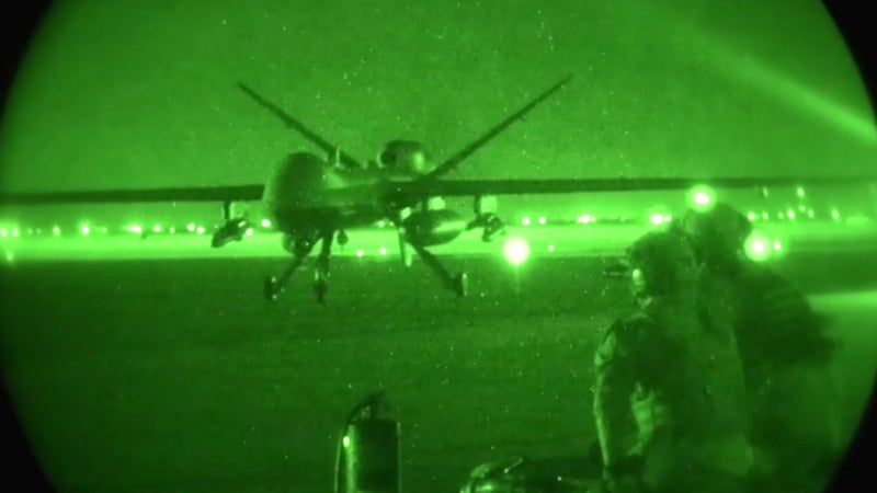 Glimpse Of The Future?: MC-130 Sets Up Forward Refueling Point For MQ-9 Reaper Drone