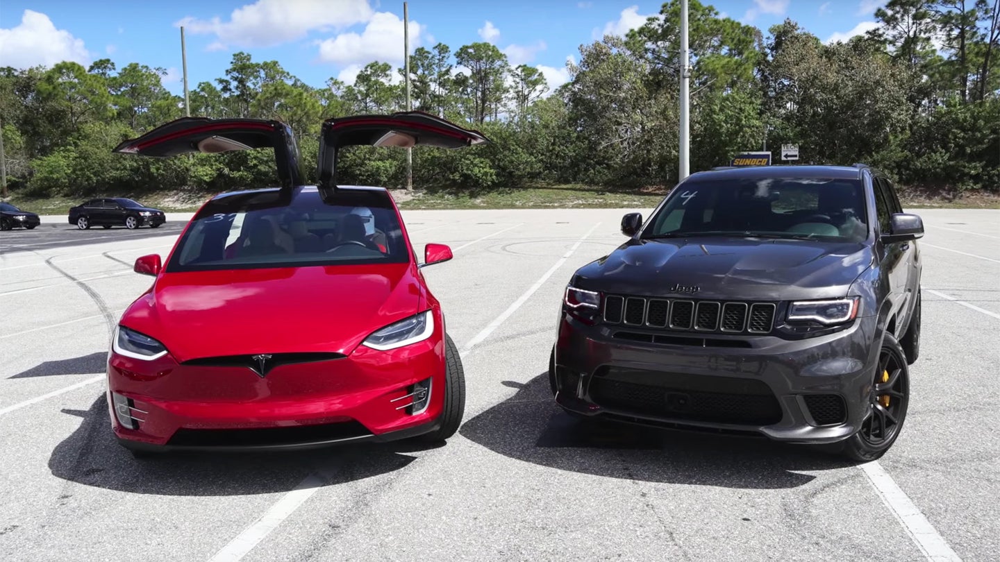 Watch a Tesla Model X Beat Down a Jeep Grand Cherokee Trackhawk on the Drag Strip