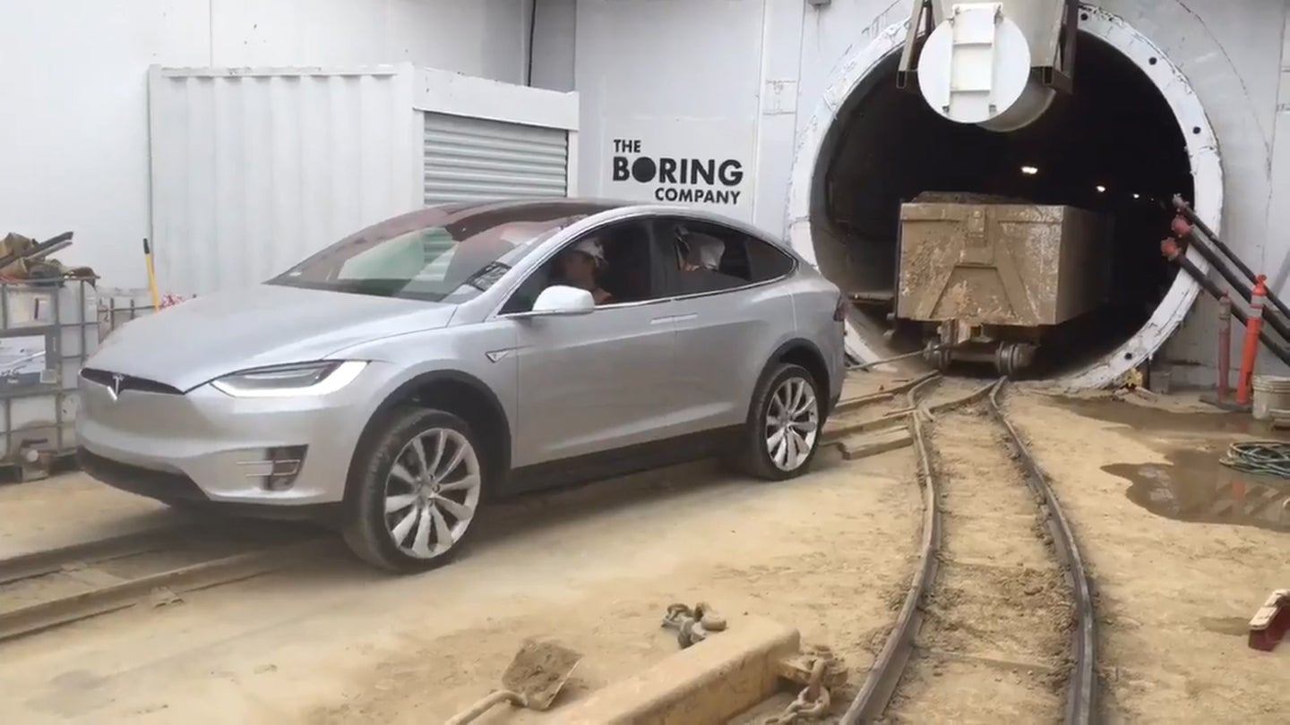 Watch a Tesla Model X Pull Rail Cars Packed With 250,000 Pounds of Debris