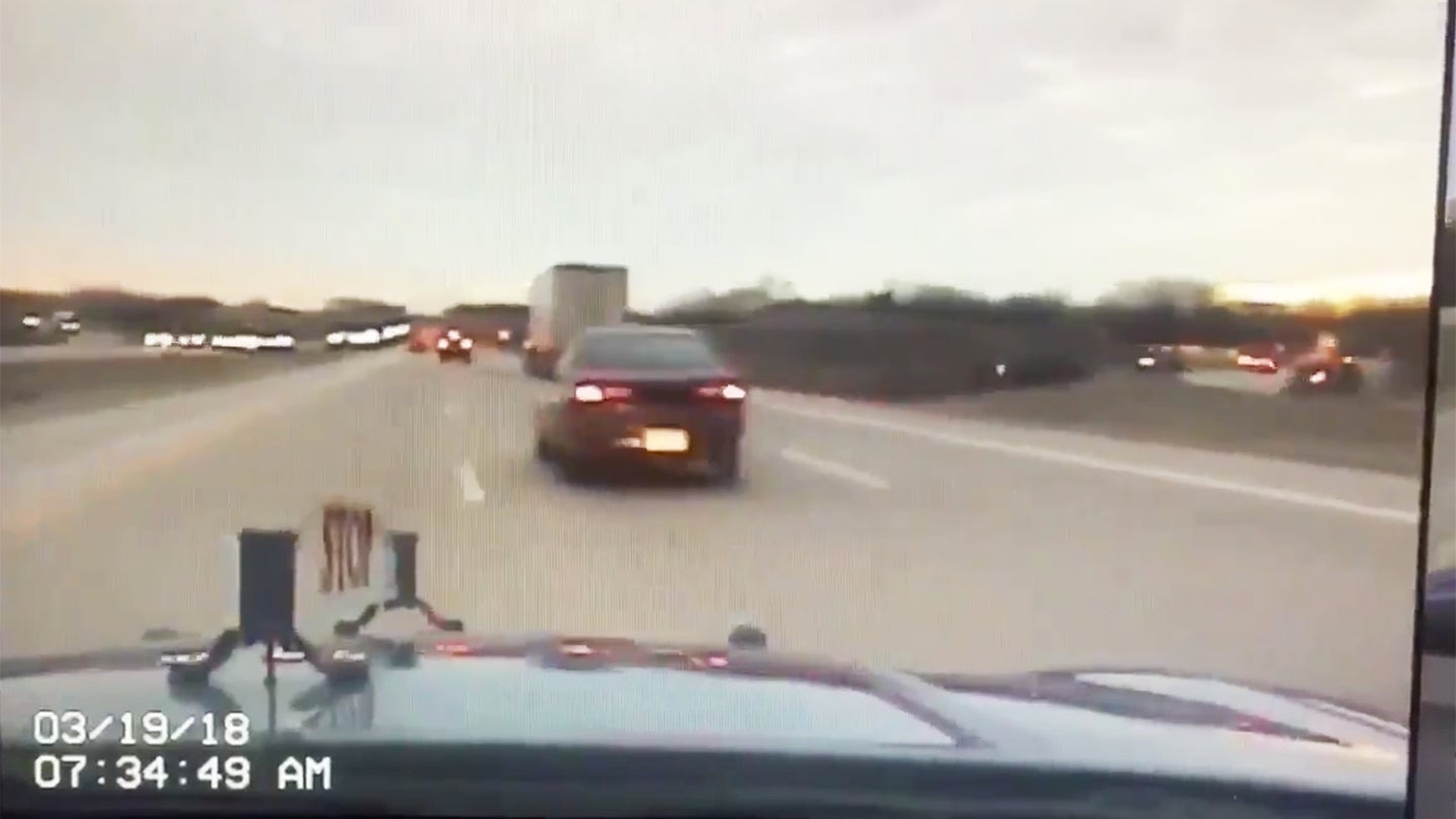 Watch This Michigan Driver Roll His Car Trying to Avoid a Simple Speeding Ticket