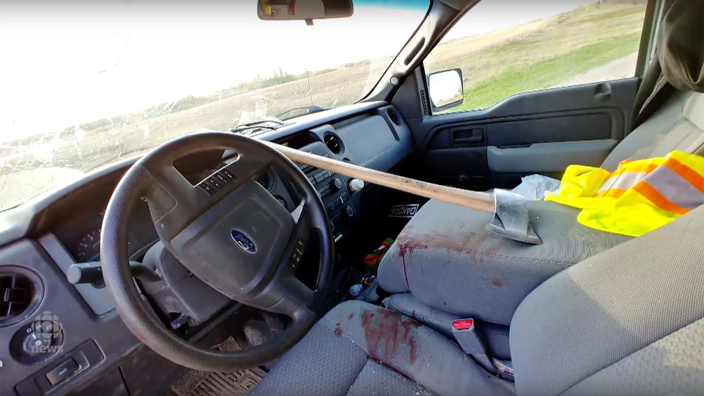 Canadian Driver Cheats Death After Axe Flies Through Windshield, Hits Him in the Face