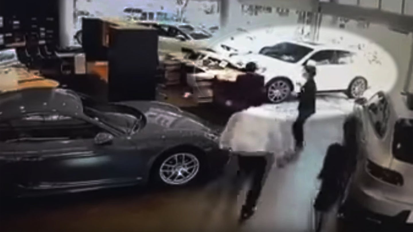Man Crashes New Porsche Cayenne Into Dealership During Sales Contract Dispute