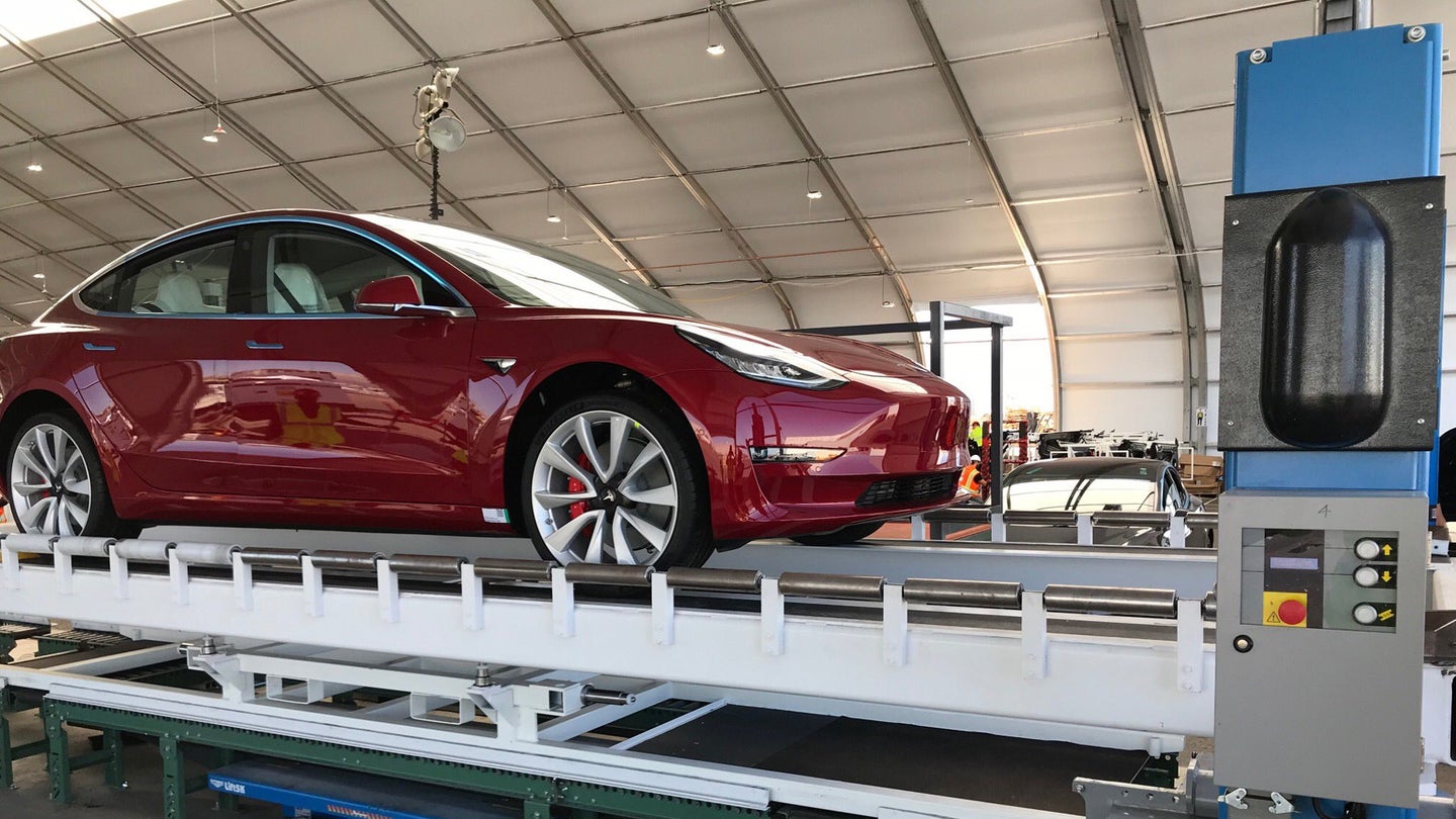 Elon Musk Praises Employees as First Performance Model 3 Rolls off Production Line