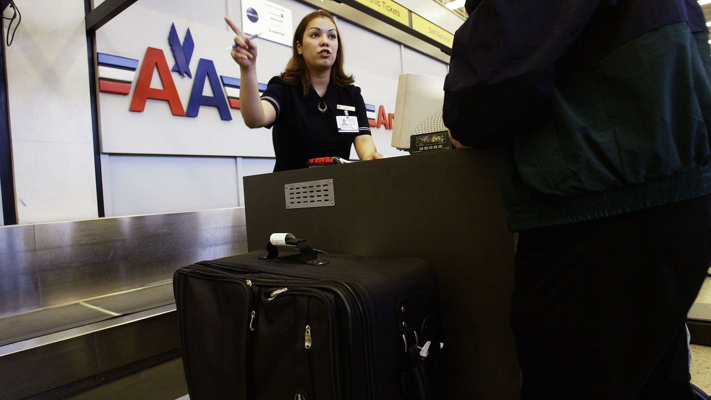 Years after US Airways Merger, American Airlines Plans Manager Layoffs and Buyouts