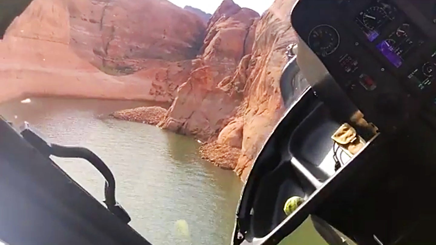 Watch This Stunt Helicopter Pilot Carve Through Lake Powell&#8217;s Crazy Tight Canyons