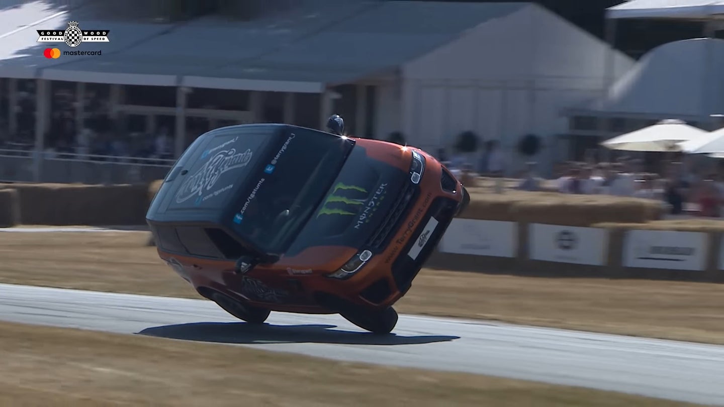 Watch This Range Rover Go Up the Goodwood Hillclimb on Two Wheels