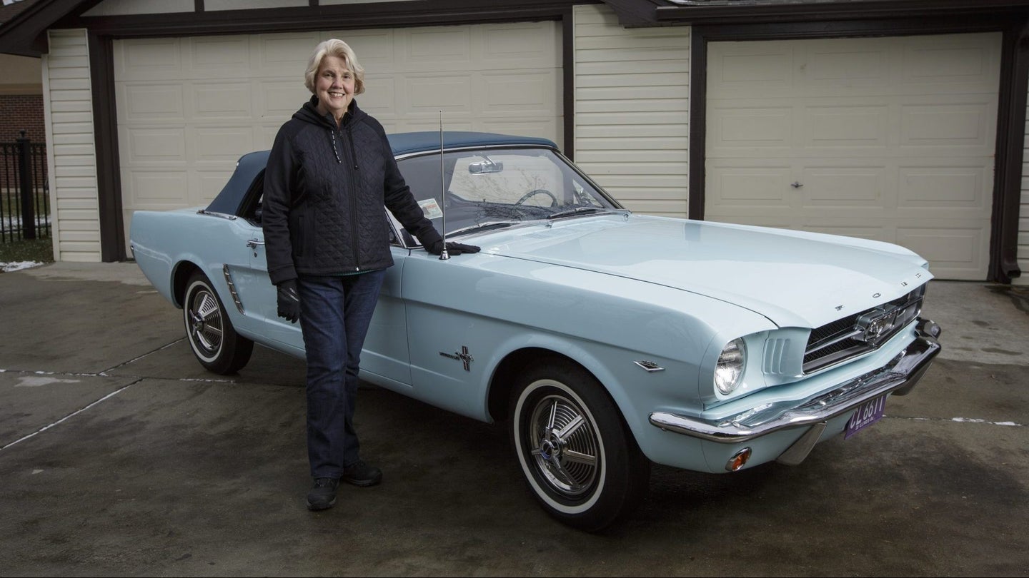 Gail Wise with her 1964 Ford Mustang in 2013