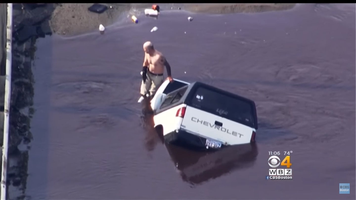 Man Drives Truck Into Watery Sinkhole