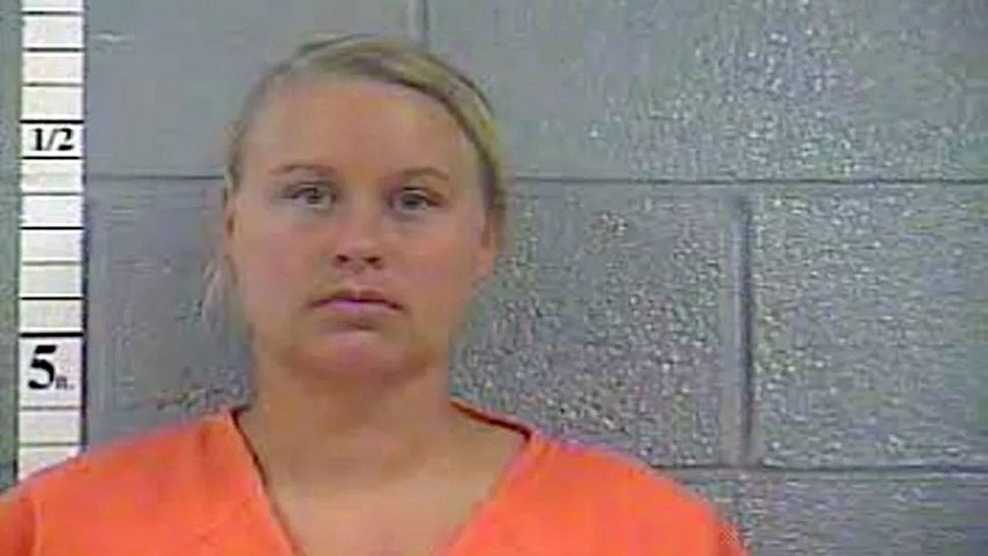 Kentucky Woman Arrested for Leaving Kids in Car With Loaded Guns While She Tanned