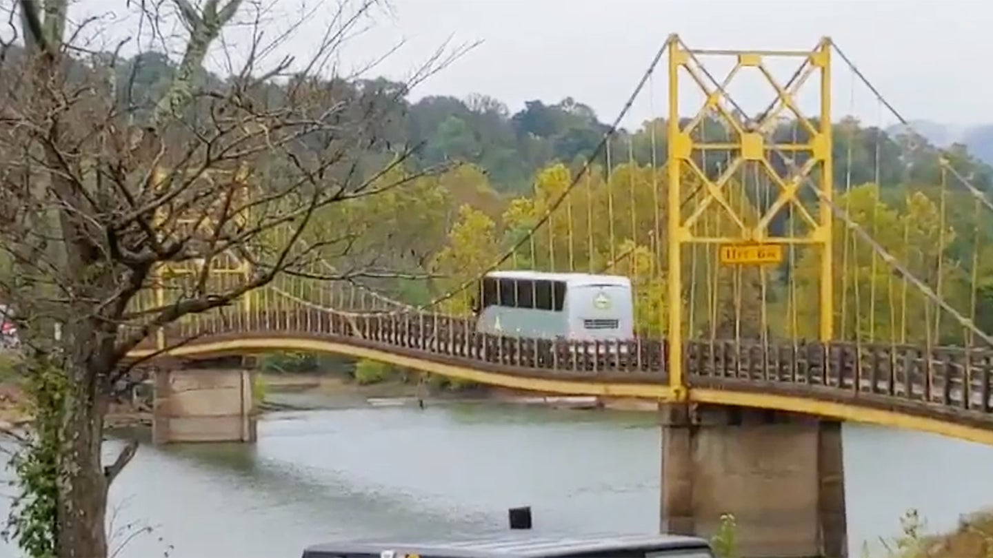 Watch This Historic Bridge Bend Dangerously Under an Overweight Coach Bus