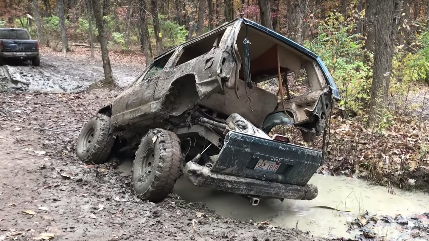 This Video of a Jeep Cherokee Breaking in Half Off-Road Is Mechanical Mayhem