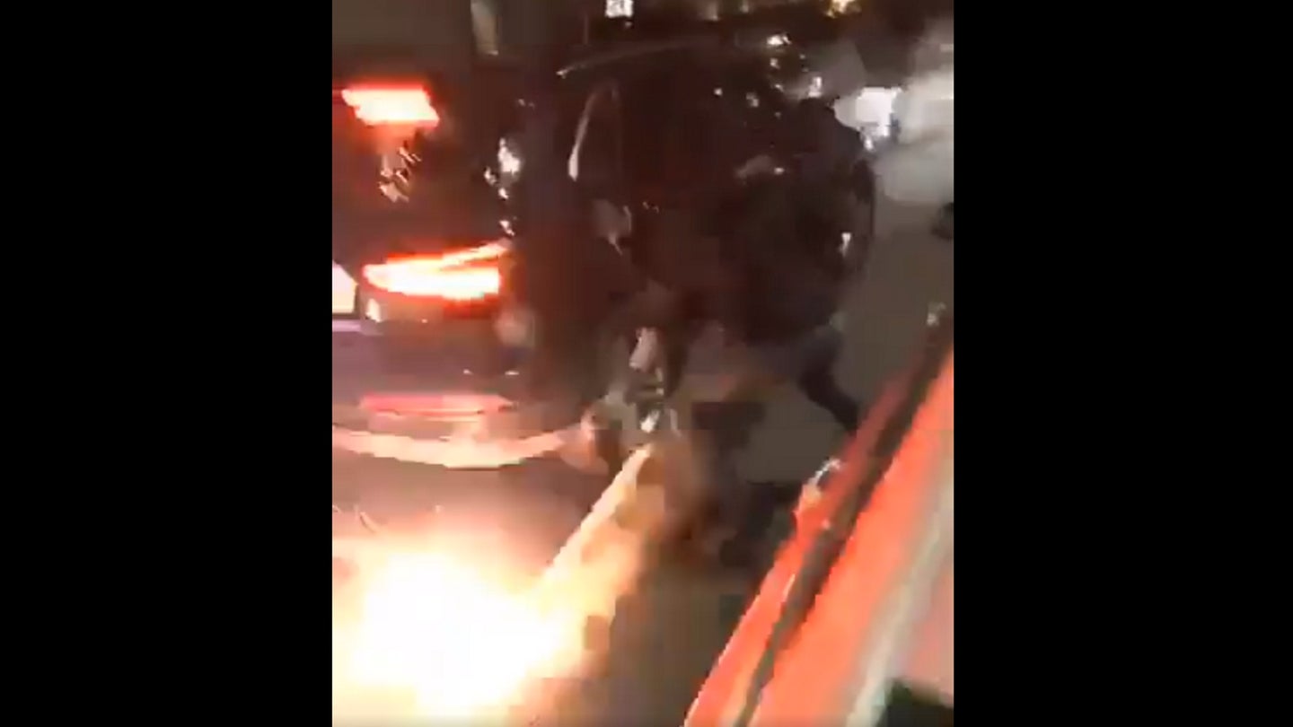 Stupid Kid Throws Lit Firework Into Parked SUV, Prank Immediately Backfires