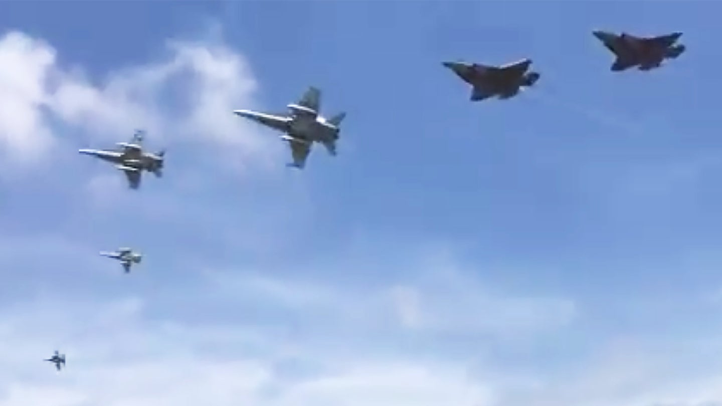 RAAF Hornet Escorts Pull Off Jaw-Dropping Overhead Break To Welcome Home First Aussie F-35As